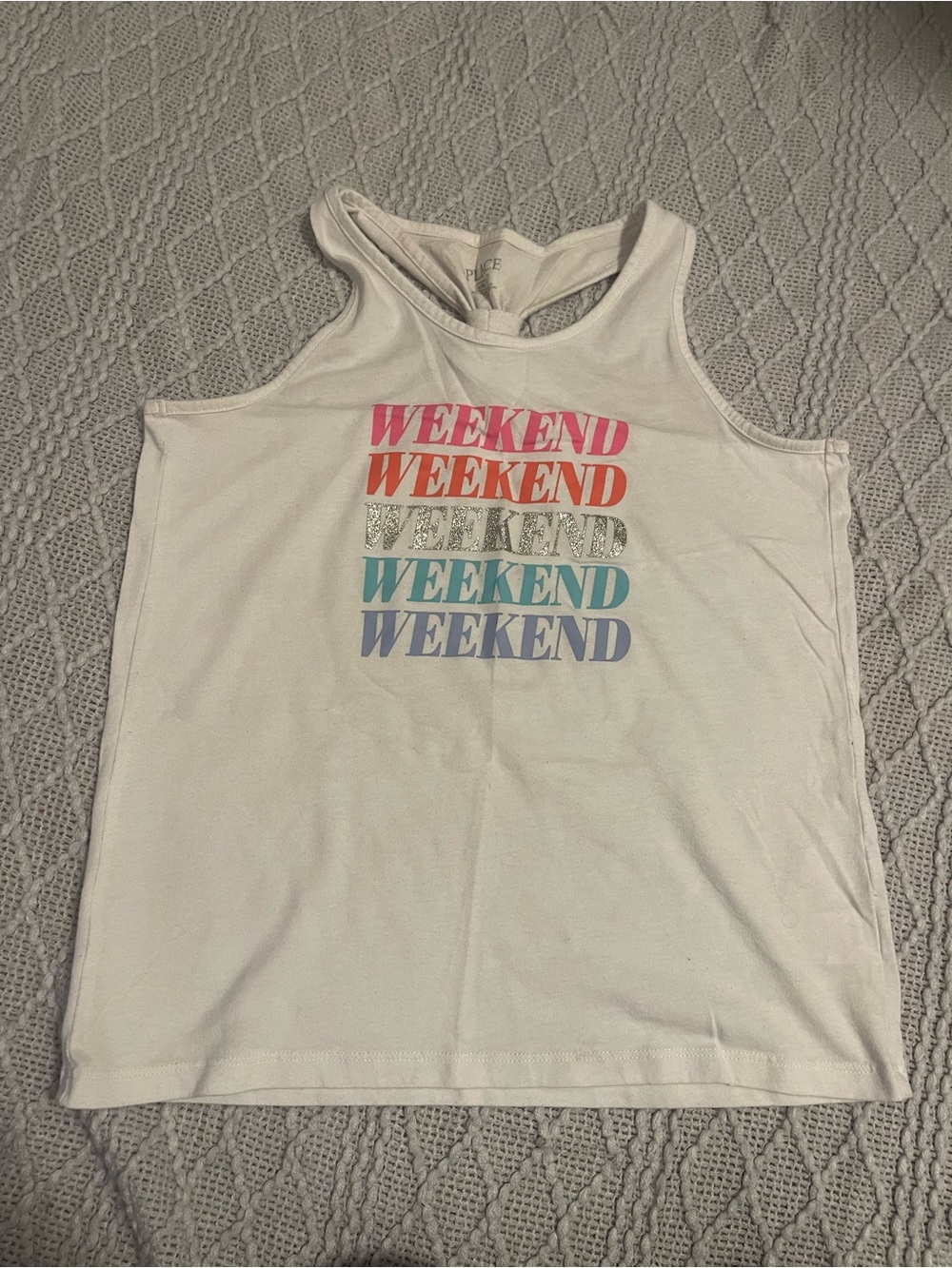 Place White Racerback Tank with Pink Graphic